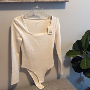 NWT Cream ribbed long sleeve body suit size small